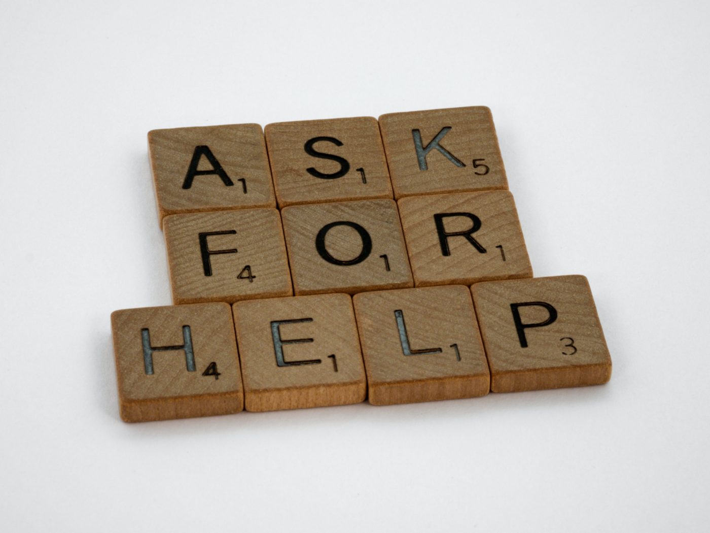 Ask for Help spelled out in blocks